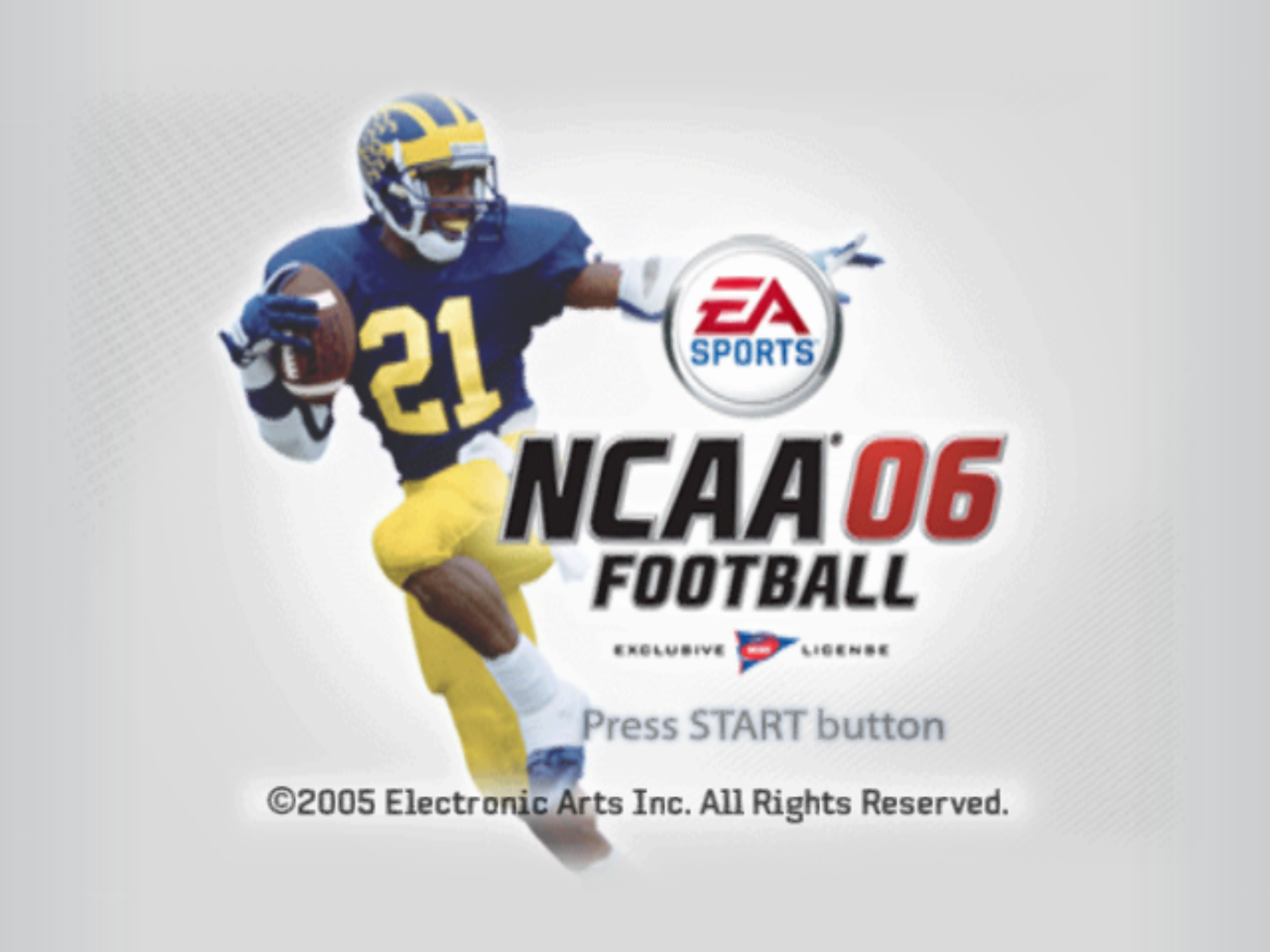 A college football player wearing a blue jersey with the number 21 and a yellow helmet (University of Michigan colors) runs forward holding a football. To his right is the EA Sports logo above the title “NCAA 06 Football.” Below, the screen reads “Press START button,” with a copyright notice for Electronic Arts at the bottom.